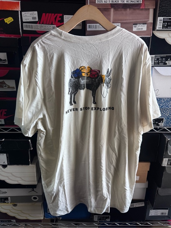 The North Face Other - The North Face Cream 'Never Stop Exploring' Donkey Graphic Tee